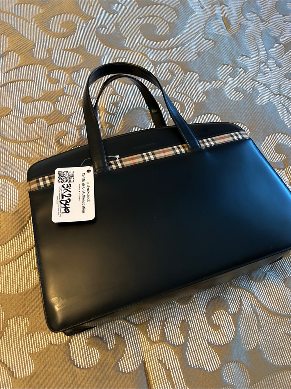 Burberry Black Bag with Iconic Check Accent